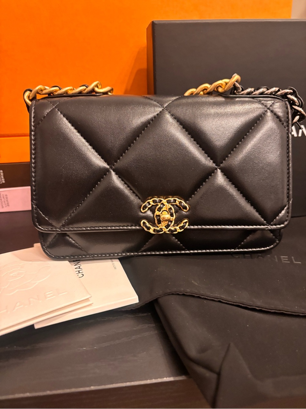 Authentic Chanel Turn Lock 19 Black Wallet on Chain